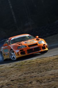 Превью обои toyota supra, toyota, автомобиль, оранжевый, дрифт, скорость