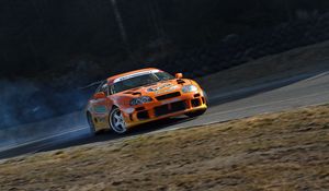 Превью обои toyota supra, toyota, автомобиль, оранжевый, дрифт, скорость