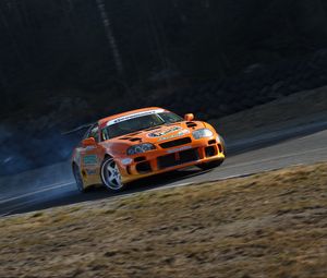 Превью обои toyota supra, toyota, автомобиль, оранжевый, дрифт, скорость