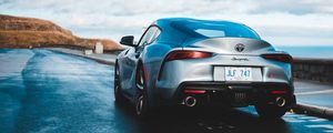 Превью обои toyota supra, toyota, машина, спорткар, серый, вид сзади, дорога