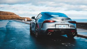 Превью обои toyota supra, toyota, машина, спорткар, серый, вид сзади, дорога