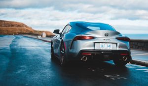 Превью обои toyota supra, toyota, машина, спорткар, серый, вид сзади, дорога