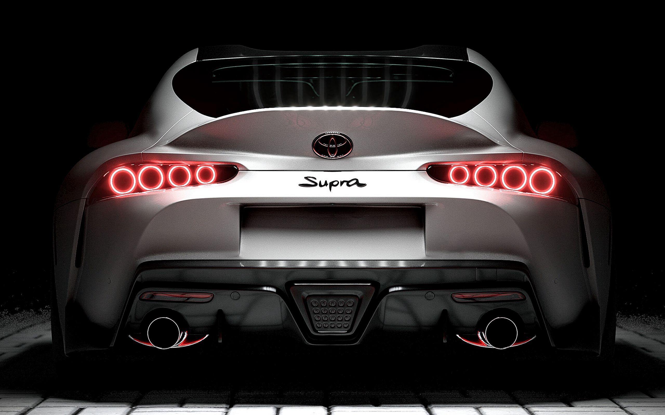 Скачать 2560x1600 toyota supra, toyota, спорткар, белый, вид сзади,  подсветка обои, картинки 16:10