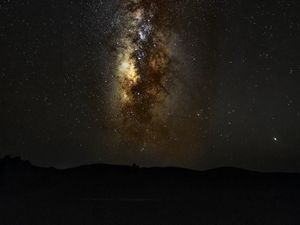 Превью обои туманность, звездное небо, звезды, холмы, космос
