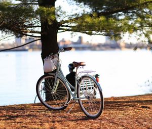 Превью обои велосипед, осень, деревья, листва, река