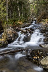 Превью обои водопад, деревья, камни, бревна, долгая выдержка