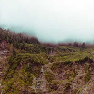 Превью обои водопад, гора, обрыв, туман, небо