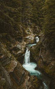 Превью обои водопад, камни, поток, ветки, деревья