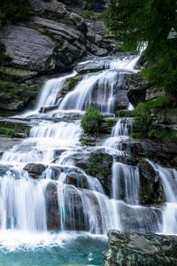 Превью обои водопад, камни, вода, скалы, кусты