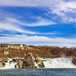 Превью обои водопад, камни, здание, природа