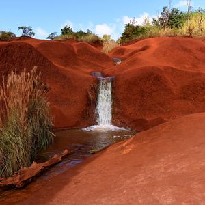 Превью обои водопад, река, песок, кусты, небо