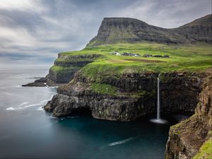 Превью обои водопад, скала, море, долина, дома