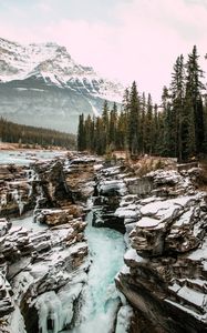 Превью обои водопад, скалы, горы, снег, заснеженный