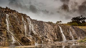 Превью обои водопад, скалы, обрыв, деревья, камни