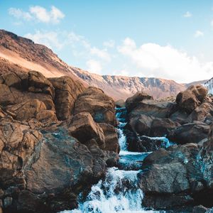 Превью обои водопад, вода, камни, скалы, небо