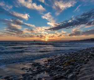 Превью обои закат, море, небо, пирс, камни