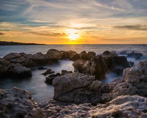 Превью обои закат, море, скалы, вода, пейзаж