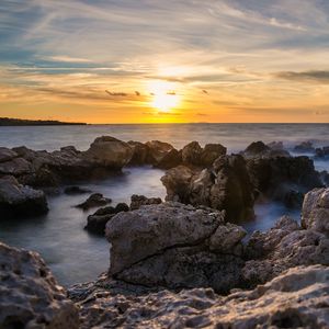 Превью обои закат, море, скалы, вода, пейзаж