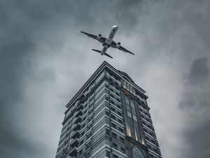 Превью обои здание, самолет, небо, серый