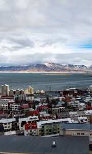 Превью обои здания, море, горы, облака, город