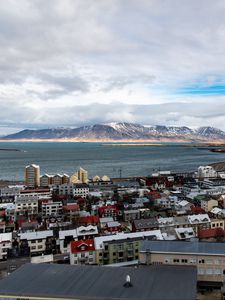 Превью обои здания, море, горы, облака, город