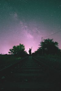 Превью обои железная дорога, звездное небо, человек, ночь