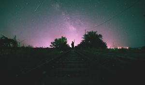 Превью обои железная дорога, звездное небо, человек, ночь