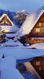 Превью обои зима, снег, домики, озеро, свет, отражение, япония